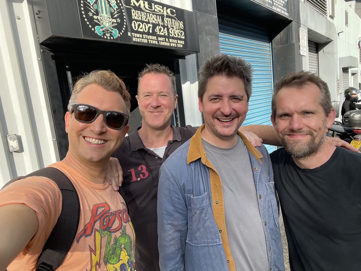 Members of Mitch's Bitches outside rehearsal studios